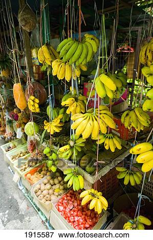 Fruit Stall Selling Local Fruits View Large Photo Image Stock Photo - Fruit Stall Selling Local Fruits. Fotosearch