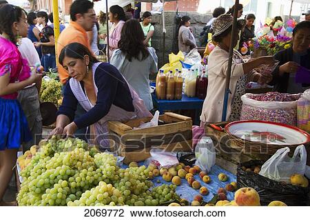 Stock Image - Fruit Vendor At The Jueves De Comadres Market During Carnaval Chapaco, Tarija, Bolivia. Fotosearch