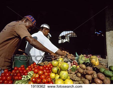 Fruitsellers Laying Out Fruit View Large Photo Image Stock Image - Fruitsellers Laying Out Fruit. Fotosearch