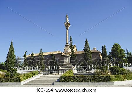 Picture - Fuente Del Triunfo Statue And Royal Hospital, Granada, Spain. Fotosearch