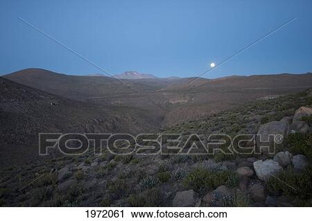 Full Moon Over The Altiplano Near Ollague, Antofagasta Region, Chile View Large Photo Image Stock Image - Full Moon Over The Altiplano Near Ollague, Antofagasta Region, Chile. Fotosearch