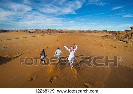 Fun in the sand dunes; Tabuk, Saudi Arabia View Large Photo Image Stock Photo - Fun in the sand dunes; Tabuk, Saudi Arabia. Fotosearch