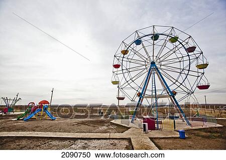 Funfair Rides And Ferris Wheel In Iraqi Kurdistan, Iraq View Large Photo Image Stock Image - Funfair Rides And Ferris Wheel In Iraqi Kurdistan, Iraq. Fotosearch