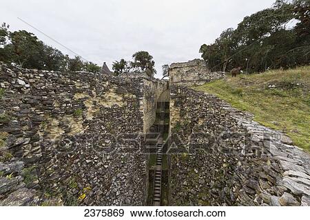 Funnel-shaped defensive entrance to Kuelap Fortress, Kuelap, Amazonas, Peru View Large Photo Image Stock Photo - Funnel-shaped defensive entrance to Kuelap Fortress, Kuelap, Amazonas, Peru. Fotosearch