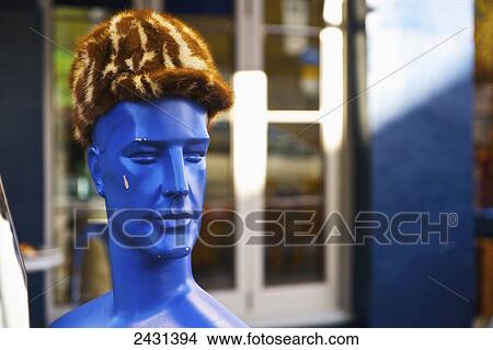 Fur hat on a blue mannequin, Portobello Market; London, England View Large Photo Image Picture - Fur hat on a blue mannequin, Portobello Market; London, England. Fotosearch