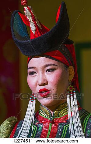 Stock Image - G. Byambajargal (Mongolian state leading artist) singing in a performance of the Tumen Ekh Mongolian National Song & Dance Ensemble in Ulaanbaatar (Ulan Bator), Mongolia. Fotosearch