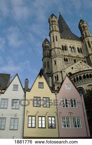 Stock Photograph - Gabled Buildings At Fischmarkt With Gross St Martin Behind. Fotosearch