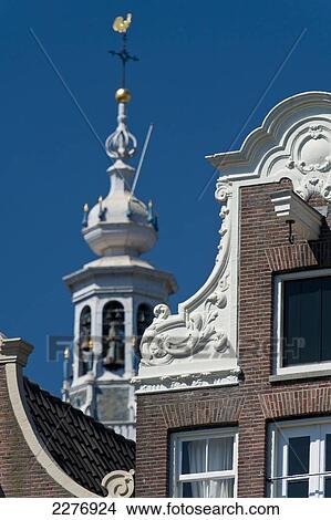 Gabled houses with the spire of the Zuiderkerk behind; Amsterdam, Holland View Large Photo Image Picture - Gabled houses with the spire of the Zuiderkerk behind; Amsterdam, Holland. Fotosearch