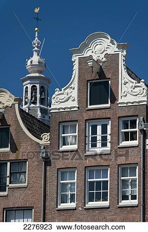Gabled houses with the spire of the Zuiderkerk behind; Amsterdam, Holland View Large Photo Image Stock Image - Gabled houses with the spire of the Zuiderkerk behind; Amsterdam, Holland. Fotosearch
