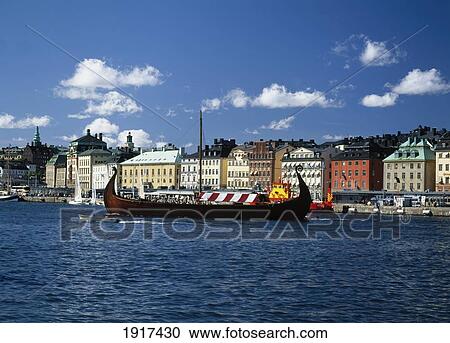 Stock Image - Gamia Stan Skyline With Barge. Fotosearch