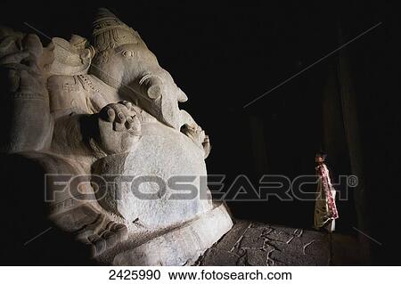 Ganesha statue in a cave; Hampi, Karnataka, India View Large Photo Image Stock Image - Ganesha statue in a cave; Hampi, Karnataka, India. Fotosearch