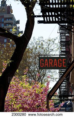 Stock Image - Garage Sign And Springtime In The West Village, Manhattan, New York, Usa. Fotosearch