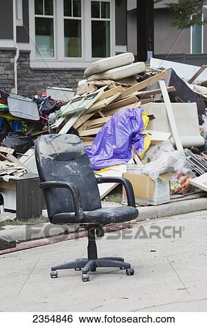 Garbage And Destroyed Household Items Piled Outside A Home After A Flood; Calgary, Alberta, Canada View Large Photo Image Stock Photograph - Garbage And Destroyed Household Items Piled Outside A Home After A Flood; Calgary, Alberta, Canada. Fotosearch