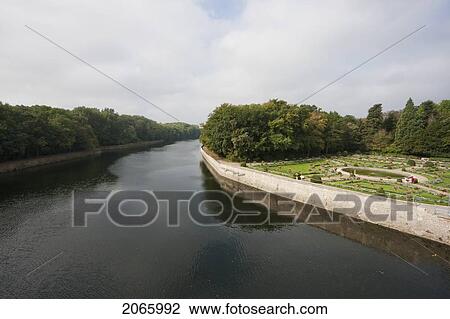 Stock Image - Garden Of Catherine De Medici By The Cher River, As Seen From The Chateau De Chenonceau, Chenonceau, Indre-Et-Loire, France. Fotosearch