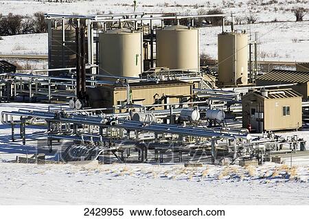 Stock Photography - Gas plant sub station in snow covered fields; Longview, Alberta, Canada. Fotosearch
