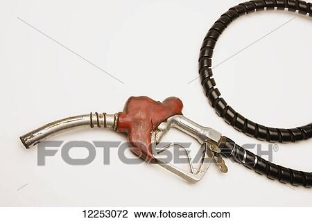 Gas pump and hose on white background View Large Photo Image Stock Image - Gas pump and hose on white background. Fotosearch