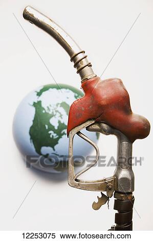 Gas pump with globe on white background View Large Photo Image Stock Photography - Gas pump with globe on white background. Fotosearch