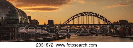 Gateshead Millennium Bridge Over The River Tyne At Dusk; Gateshead, Tyne And Wear, England View Large Photo Image Stock Image - Gateshead Millennium Bridge Over The River Tyne At Dusk; Gateshead, Tyne And Wear, England. Fotosearch