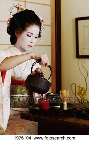 Geisha And Maiko Performing Traditional Tea Ceremony. View Large Photo Image Picture - Geisha And Maiko Performing Traditional Tea Ceremony.. Fotosearch