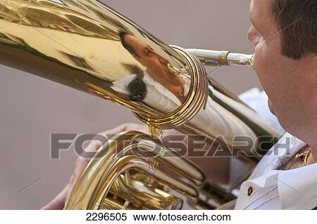 Stock Photography - Germany, Bavaria, Man playing tuba at wedding; Ortenburg. Fotosearch