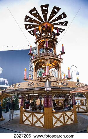 Stock Photograph - Germany, Berlin, Festive Food and drinks stall; Breitscheid Platz. Fotosearch