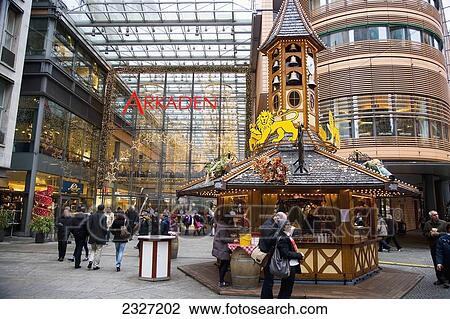 Germany, Berlin, Stalls selling festive food and drinks at Christmas Market; Potsdamer Platz View Large Photo Image Stock Image - Germany, Berlin, Stalls selling festive food and drinks at Christmas Market; Potsdamer Platz. Fotosearch