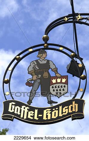 Picture - Germany: Cologne, Decorative Sign Outside Traditional Brauhaus (Brewery/Pub) In Alter Markt Copyright Anna Watson/Axiom 2006. Fotosearch