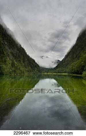 Germany, Reflections in Lake Forggensee near Ruhpolding; Bavaria View Large Photo Image Stock Photo - Germany, Reflections in Lake Forggensee near Ruhpolding; Bavaria. Fotosearch