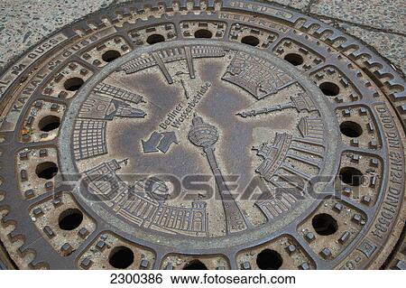 Germany, Sewer cover depicting various Berlin landmarks; Berlin View Large Photo Image Stock Photograph - Germany, Sewer cover depicting various Berlin landmarks; Berlin. Fotosearch