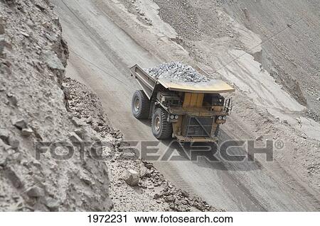 Giant Truck Laden With Ore At Chuquicamata, The Largest Open Pit Copper Mine In The World, Antofagasta Region, Chile View Large Photo Image Stock Image - Giant Truck Laden With Ore At Chuquicamata, The Largest Open Pit Copper Mine In The World, Antofagasta Region, Chile. Fotosearch