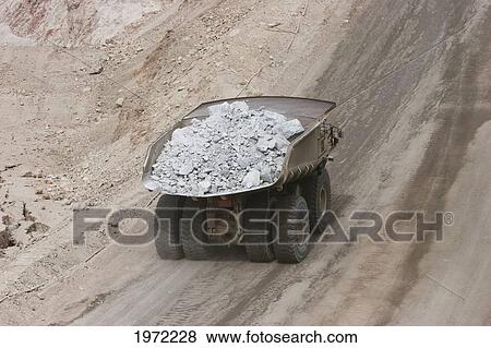 Stock Photo - Giant Truck Laden With Ore At Chuquicamata, The Largest Open Pit Copper Mine In The World, Antofagasta Region, Chile. Fotosearch