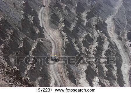 Giant Truck Laden With Ore At Chuquicamata, The Largest Open Pit Copper Mine In The World, Antofagasta Region, Chile View Large Photo Image Stock Photo - Giant Truck Laden With Ore At Chuquicamata, The Largest Open Pit Copper Mine In The World, Antofagasta Region, Chile. Fotosearch