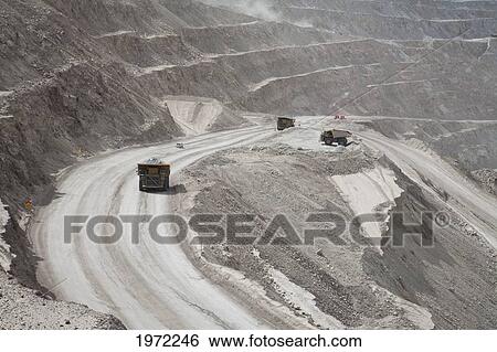 Stock Photograph - Giant Truck Laden With Ore At Chuquicamata, The Largest Open Pit Copper Mine In The World, Antofagasta Region, Chile. Fotosearch
