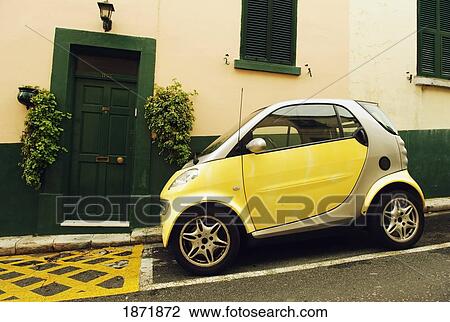 Gibraltar; Small Yellow Car Parked On The Street View Large Photo Image Stock Image - Gibraltar; Small Yellow Car Parked On The Street. Fotosearch