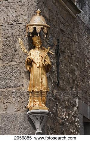 Gilded Bishop Statue On The Wall Of Aachen Cathedral, Aachen, Germany View Large Photo Image Stock Photography - Gilded Bishop Statue On The Wall Of Aachen Cathedral, Aachen, Germany. Fotosearch