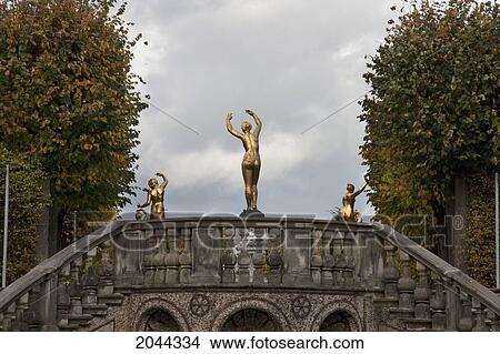 Picture - Gilded Statue In The Great Parterre Of Herrenhausen Gardens, Hannover, Lower Saxony, Germany. Fotosearch