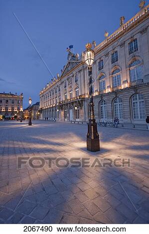 Gilded Wrought Iron Lantern, Created By Jean Lamou In Front Of The Hotel De Ville (City Hall) On Place Stanislas At Night, Nancy, France View Large Photo Image Stock Image - Gilded Wrought Iron Lantern, Created By Jean Lamou In Front Of The Hotel De Ville (City Hall) On Place Stanislas At Night, Nancy, France. Fotosearch