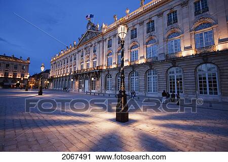 Gilded Wrought Iron Lantern, Created By Jean Lamou In Front Of The Hotel De Ville (City Hall) On Place Stanislas At Night, Nancy, France View Large Photo Image Stock Image - Gilded Wrought Iron Lantern, Created By Jean Lamou In Front Of The Hotel De Ville (City Hall) On Place Stanislas At Night, Nancy, France. Fotosearch