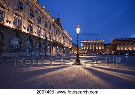 Stock Photography - Gilded Wrought Iron Lantern, Created By Jean Lamou In Front Of The Hotel De Ville (City Hall) On Place Stanislas At Night, Nancy, France. Fotosearch
