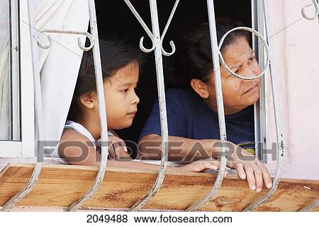 Girl And Woman In Window On Cerro Santa Ana, Guayaquil, Guayas, Ecuador View Large Photo Image Stock Photo - Girl And Woman In Window On Cerro Santa Ana, Guayaquil, Guayas, Ecuador. Fotosearch
