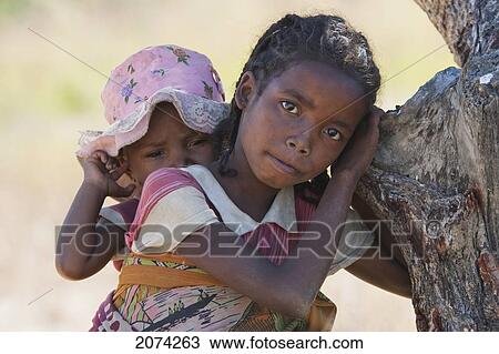 Girl & Baby, Ranohira, Fianarantsoa Province, Madagascar View Large Photo Image Stock Image - Girl & Baby, Ranohira, Fianarantsoa Province, Madagascar. Fotosearch