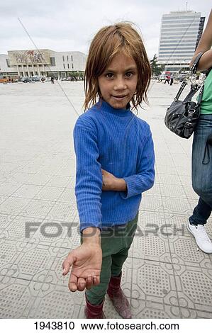 Girl Begging, Tirana, Albania View Large Photo Image Stock Image - Girl Begging, Tirana, Albania. Fotosearch