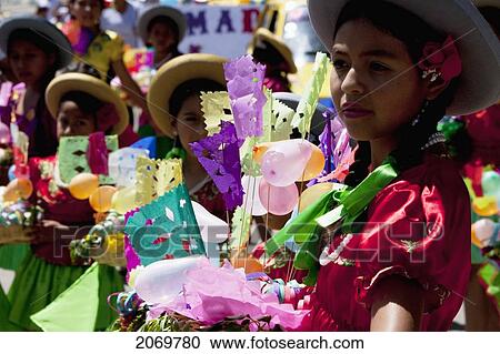 Girl Carrying Festive Baskets In The Entrada De Comadritas Parade During The Carnaval Chapaco, Tarija, Bolivia View Large Photo Image Stock Image - Girl Carrying Festive Baskets In The Entrada De Comadritas Parade During The Carnaval Chapaco, Tarija, Bolivia. Fotosearch