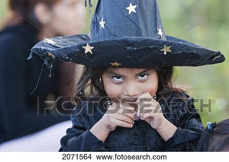 Picture - Girl Dressed In A Halloween Costume For The Celebration Of D. Fotosearch