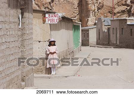 Stock Image - Girl Dressed In Her Sunday Finest, Villa Del Mar, Potosi Department, Bolivia. Fotosearch