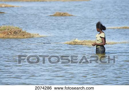 Girl Fishing Near Antsokay, Toliara Province, Madagascar View Large Photo Image Stock Photograph - Girl Fishing Near Antsokay, Toliara Province, Madagascar. Fotosearch