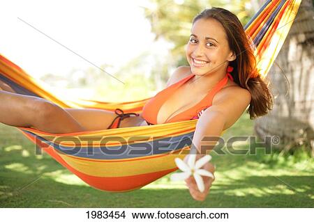 Picture - Girl Hanging In A Hammock.. Fotosearch