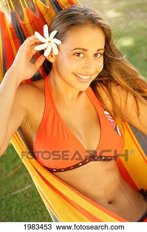 Stock Image - Girl Hanging In A Hammock.. Fotosearch