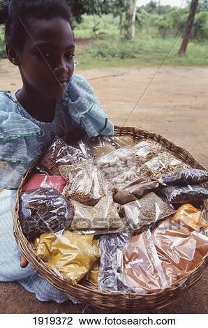 Girl Holding Basket Of Spices á View Large Photo Image Stock Image - Girl Holding Basket Of Spices á. Fotosearch