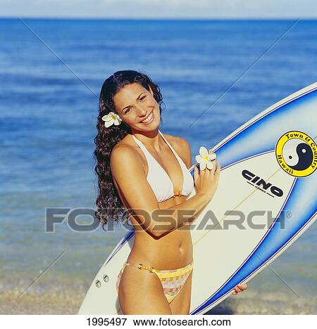 Girl In Bikini On The Beach Holding A Surfboard. View Large Photo Image Stock Photo - Girl In Bikini On The Beach Holding A Surfboard.. Fotosearch